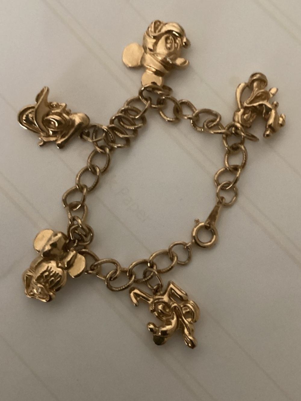Gold  tone Disney Charm Bracelet with All Your Favorite Characters!